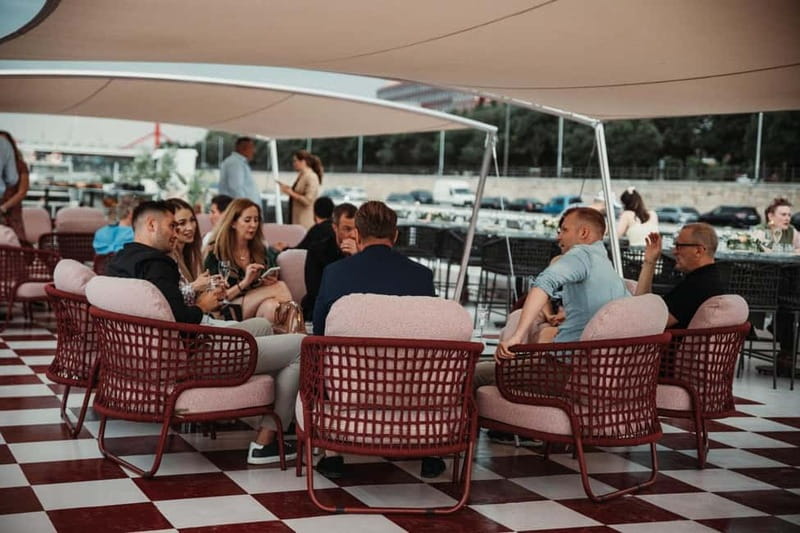 Budapest: BBQ Dinner Cruise w/ Live Music & Unlimited Drinks - Meeting the River Diva beneath Parliament