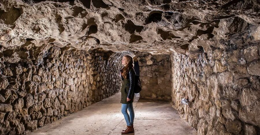 Budapest: Buda Castle Cave Tour - From medieval spaces to wartime shelters