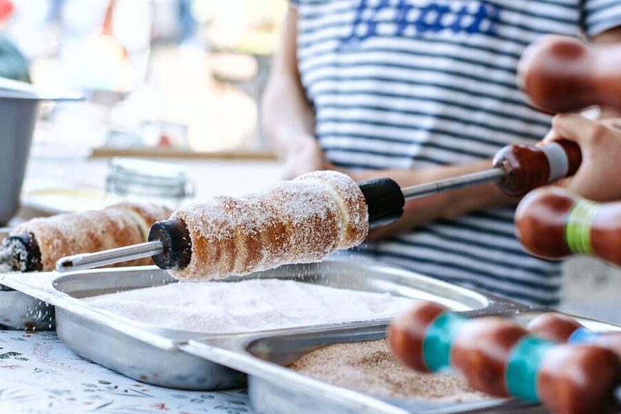 Budapest: Chimney Cake Workshop in City Park - Shaping and baking three small kürtőskalács