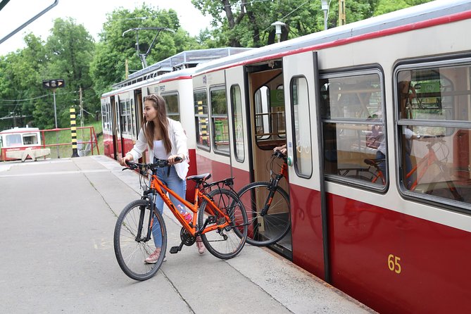 Budapest: Private Adventure Sightseeing Bicycle Tour - Crossing Margaret Bridge toward the Buda Hills