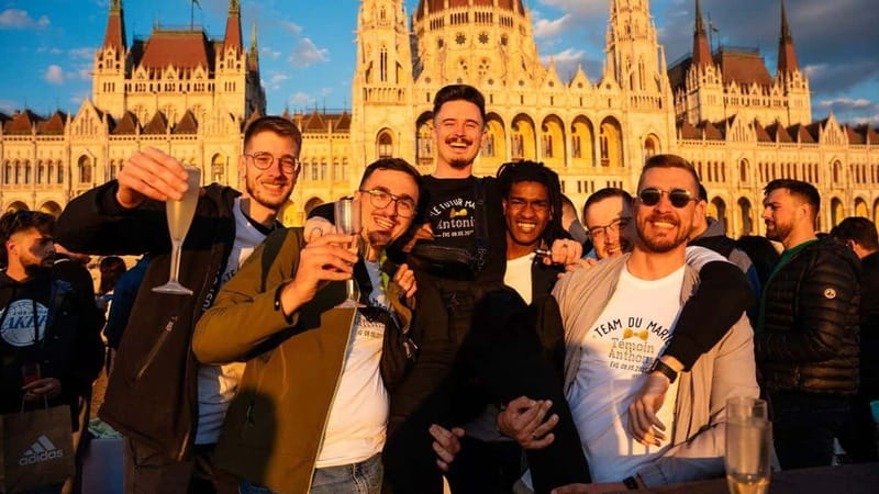 Budapest: Sip and Sail River Cruise with Unlimited Prosecco - The return past Vigadó Concert Hall and Gresham Palace