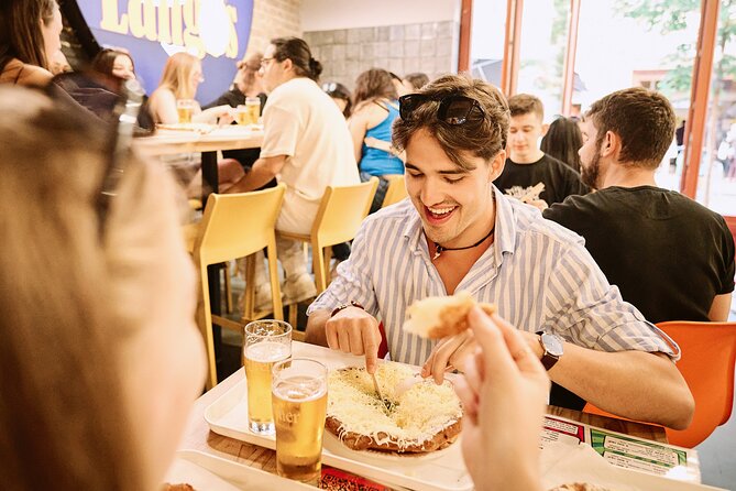 Central Budapest Food Walking Tour with Drinks Included - Walking, timing, and group size