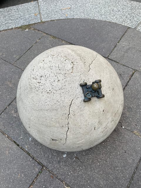 Tiny Sculptures, Big Stories: Kolodko mini statue tour - A moving tour, not a single neighborhood walk